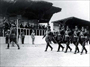 1933 – 10. yıl Cumhuriyet Bayramı’nda askerî birlikler ve bisikletli izciler geçit töreninde