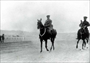 1936 – Ankara’da Hipodrom alanında yaveriyle ata binerken
